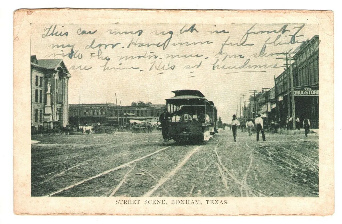 Street scene in Bonham, Texas, with a streetcar on the square, from a postcard mailed in 1919